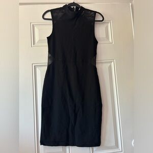 Black dress with mesh detailing on the sides
